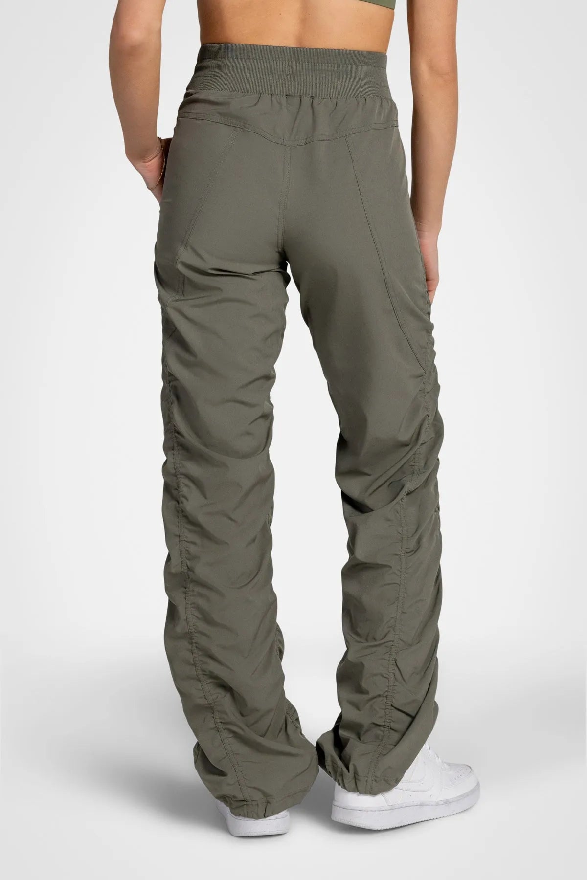 Women’s Dusty Olive Adventurous Pant, full-body studio image showing the relaxed silhouette from waist to ankle.