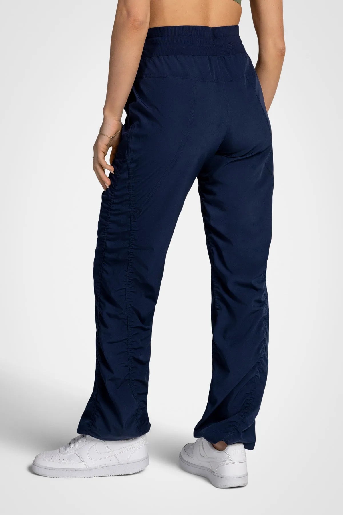 Women’s Mood Indigo Adventurous Pant, full-body studio pose showing the relaxed silhouette from waist to ankle.