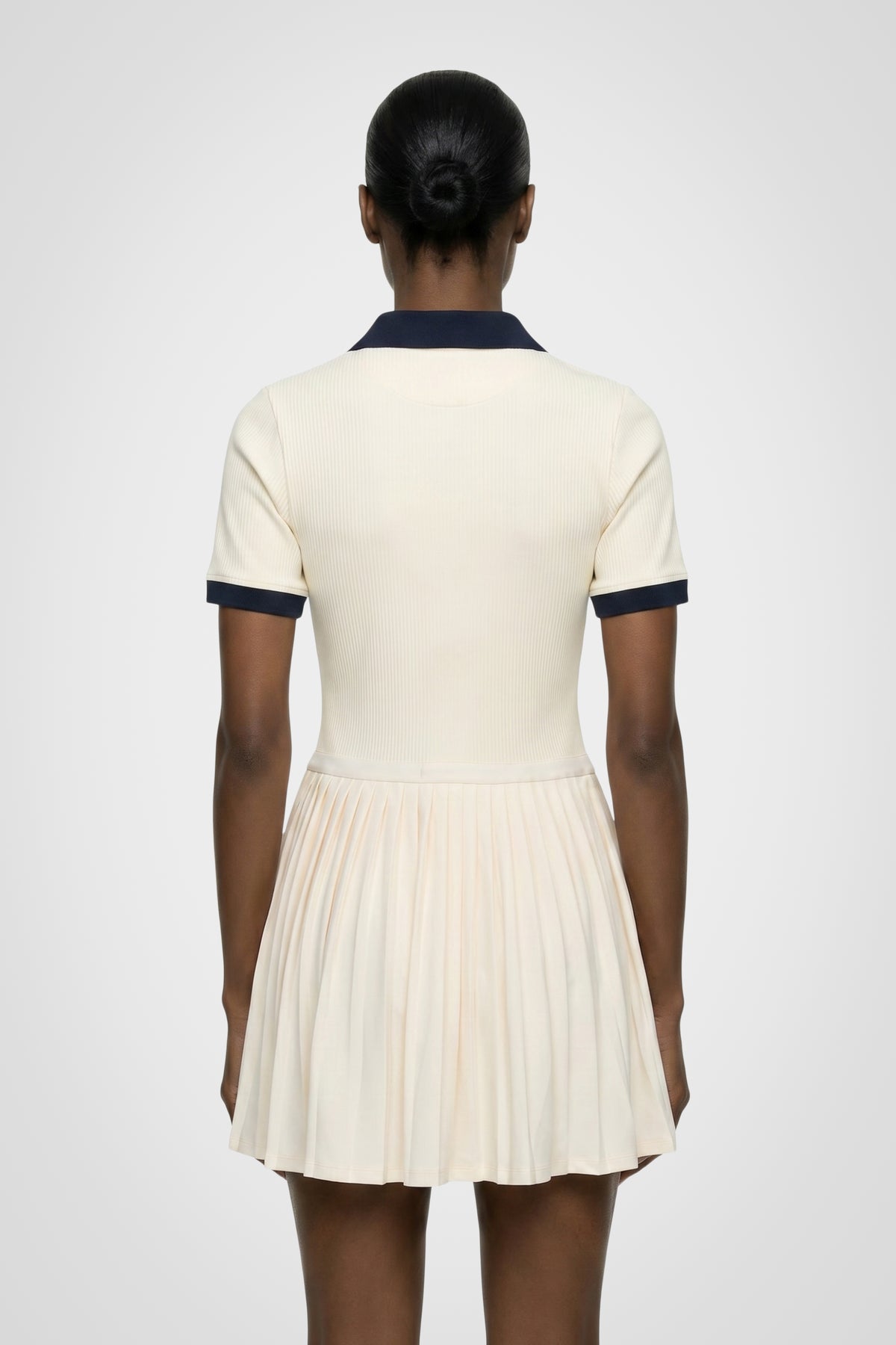 Courtline Pleated Polo Dress