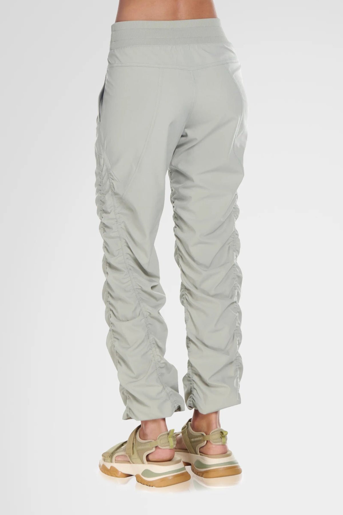Women’s Cement Adventurous Pant, full-body studio image showing the relaxed fit from waist to ankle.