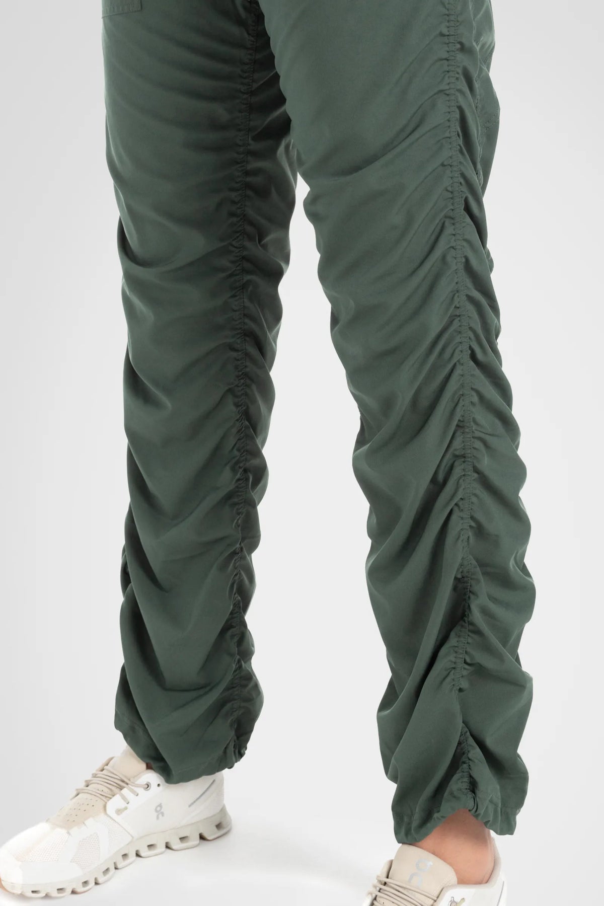 Women’s Cilantro Adventurous Pant, front studio view showing the patch pockets, tapered leg and gathered cuffs.