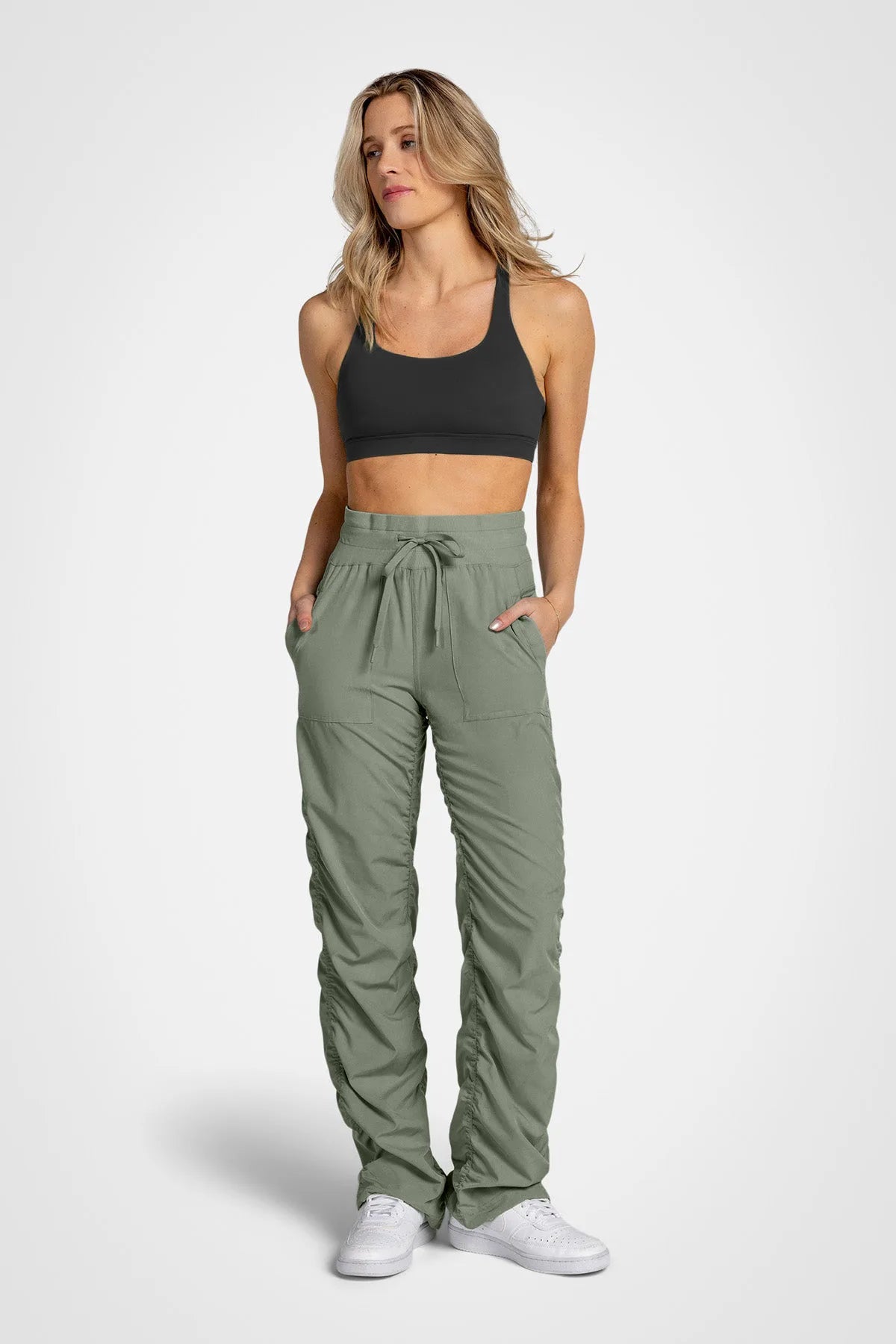 Women’s Laurel Adventurous Pant, rear studio view showing the relaxed fit through the seat and ankle.