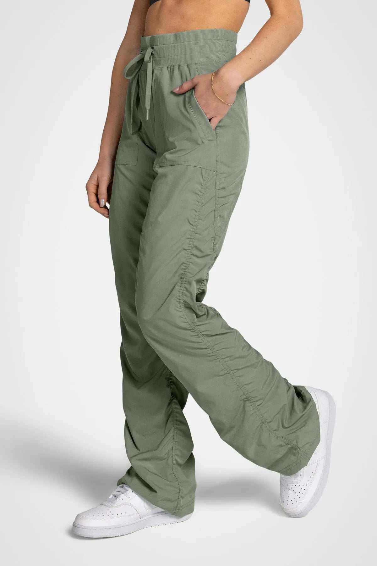 Women’s Laurel Adventurous Pant, full-body studio pose showing the relaxed fit from waist to ankle.