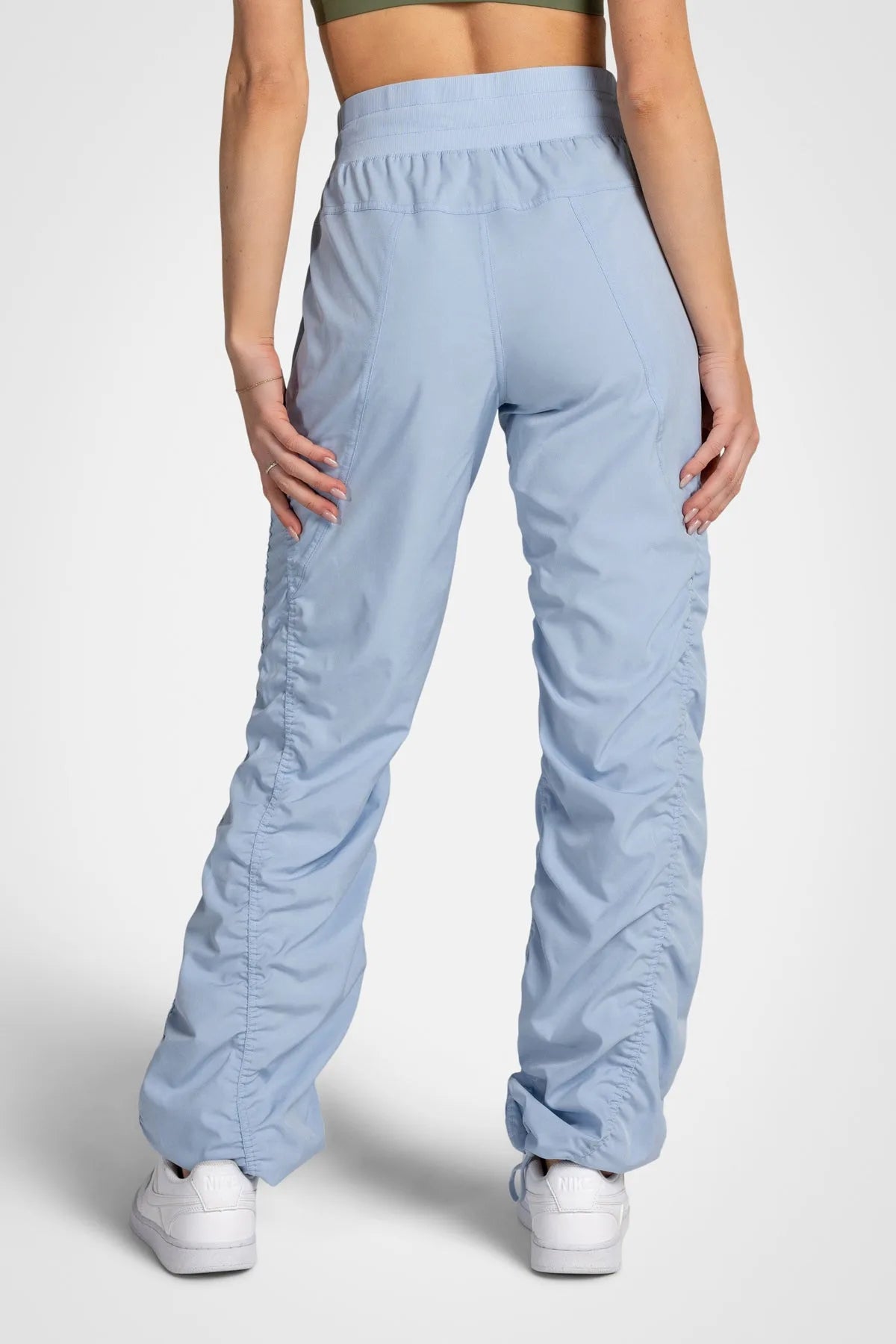 Women’s Skyway Adventurous Pant, full-body studio pose showing the relaxed silhouette from waist to ankle.