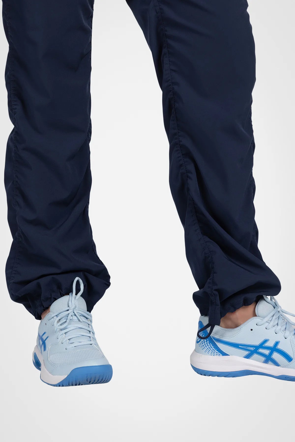 Women’s Mood Indigo Adventurous Pant, close-up showing the oversized patch pocket and drawstring waistband.