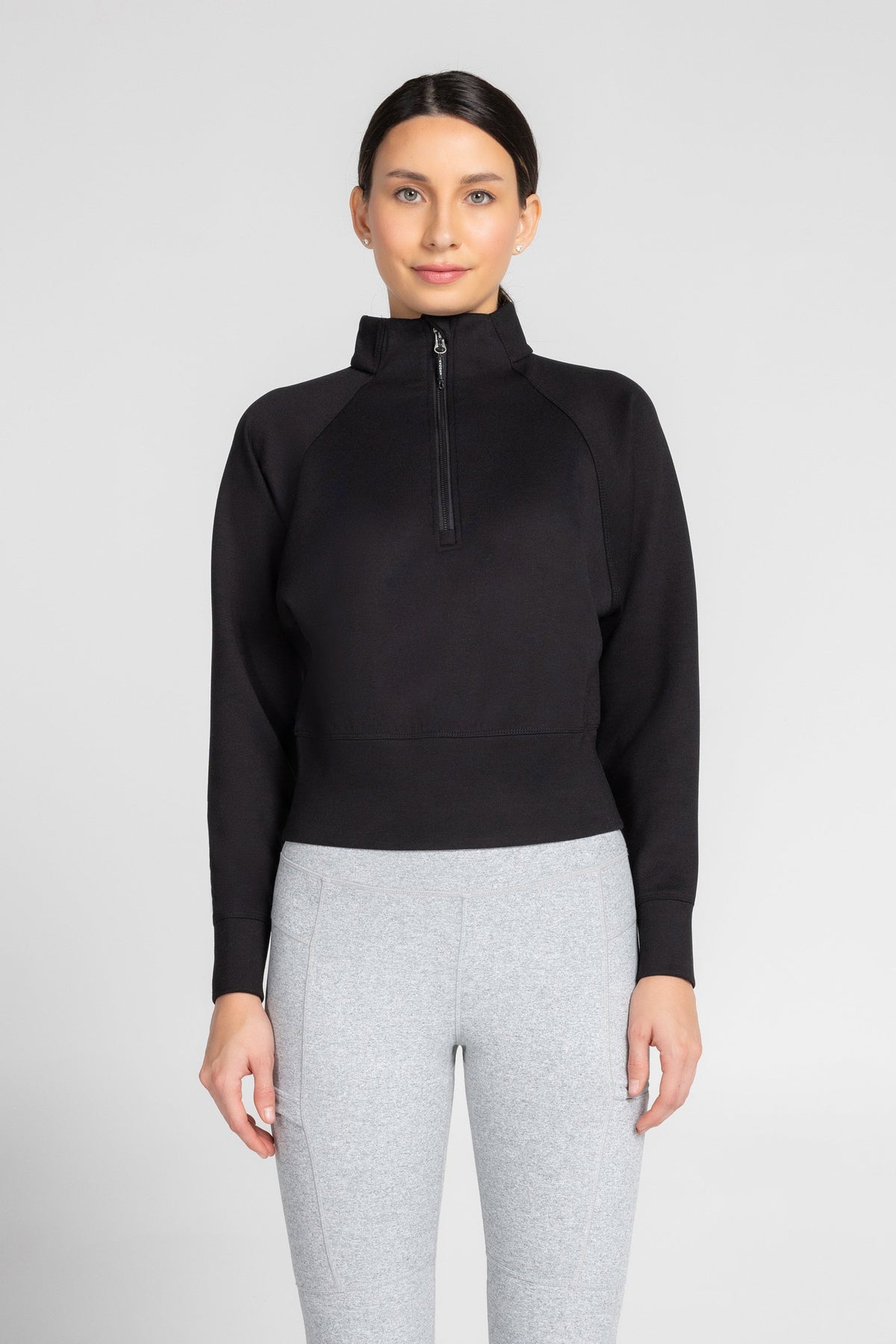 Haut à manches longues et demi-zip en tricot extensible à col montant