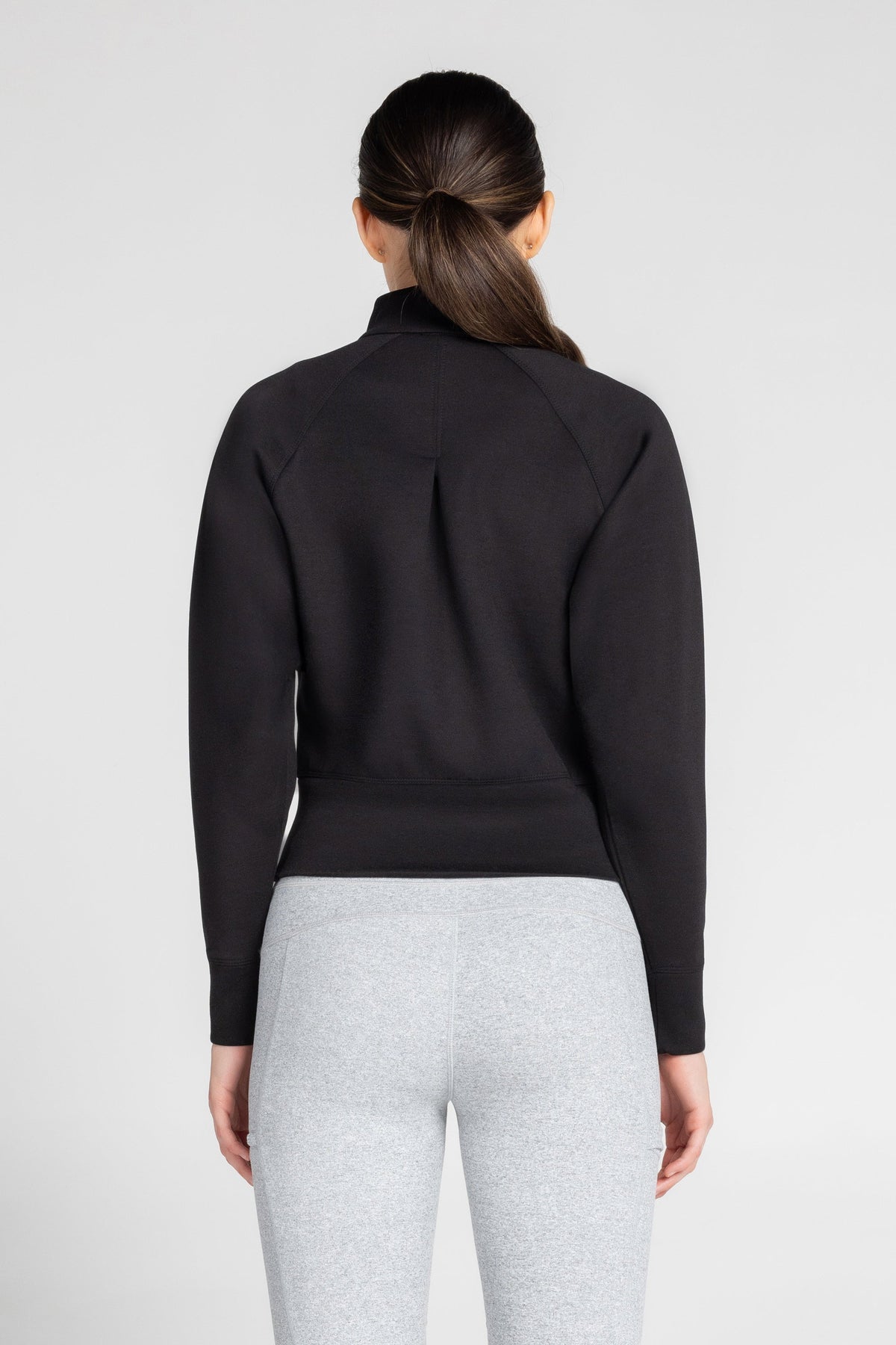 Haut à manches longues et demi-zip en tricot extensible à col montant