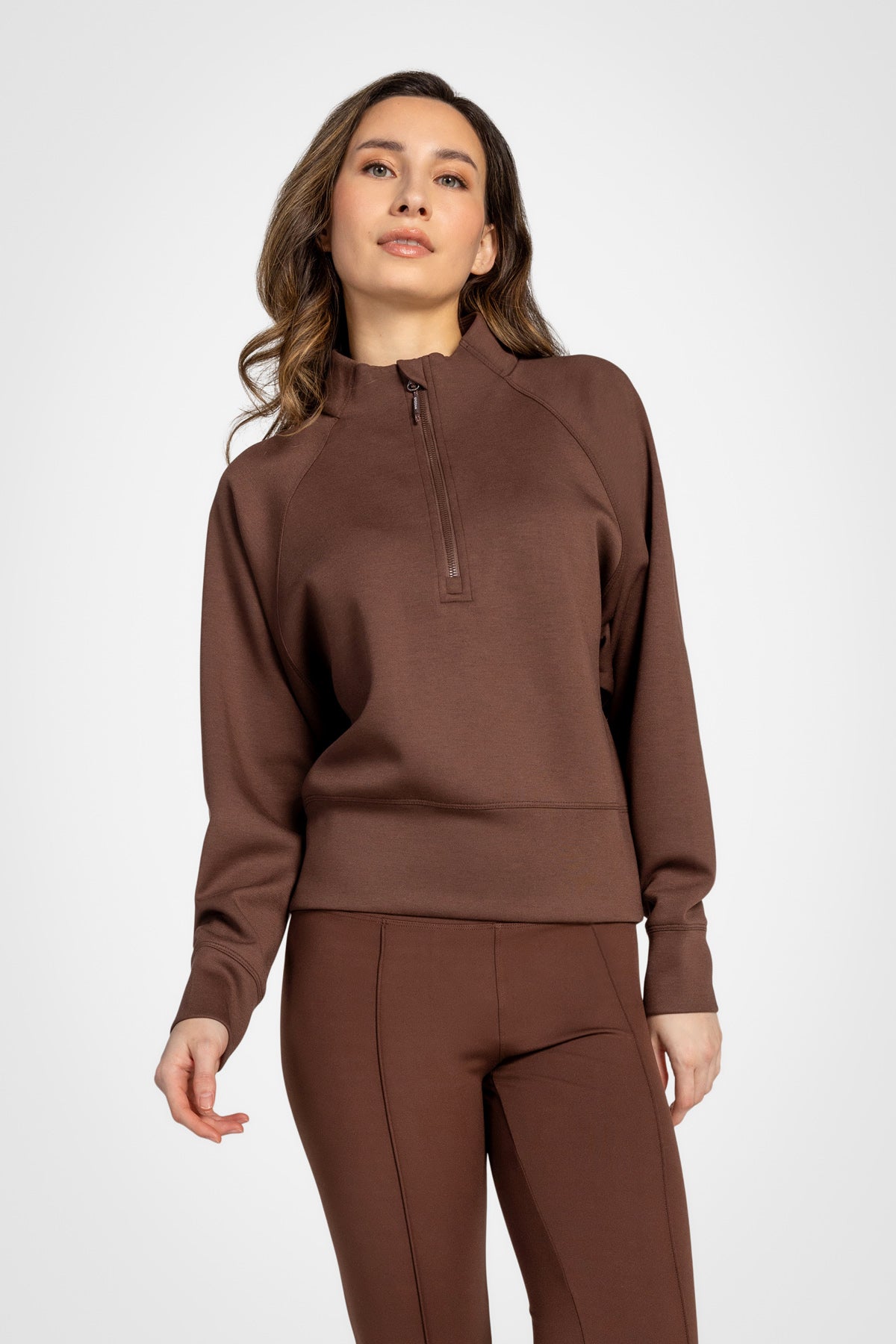 Haut à manches longues et demi-zip en tricot extensible à col montant