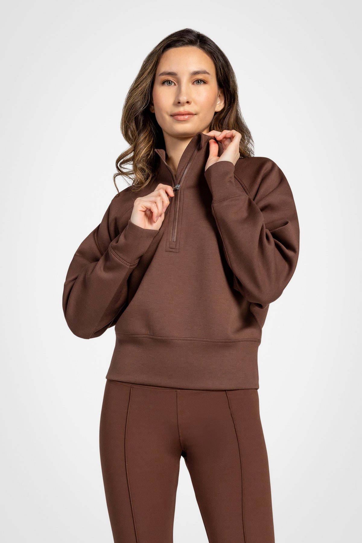 Haut à manches longues et demi-zip en tricot extensible à col montant