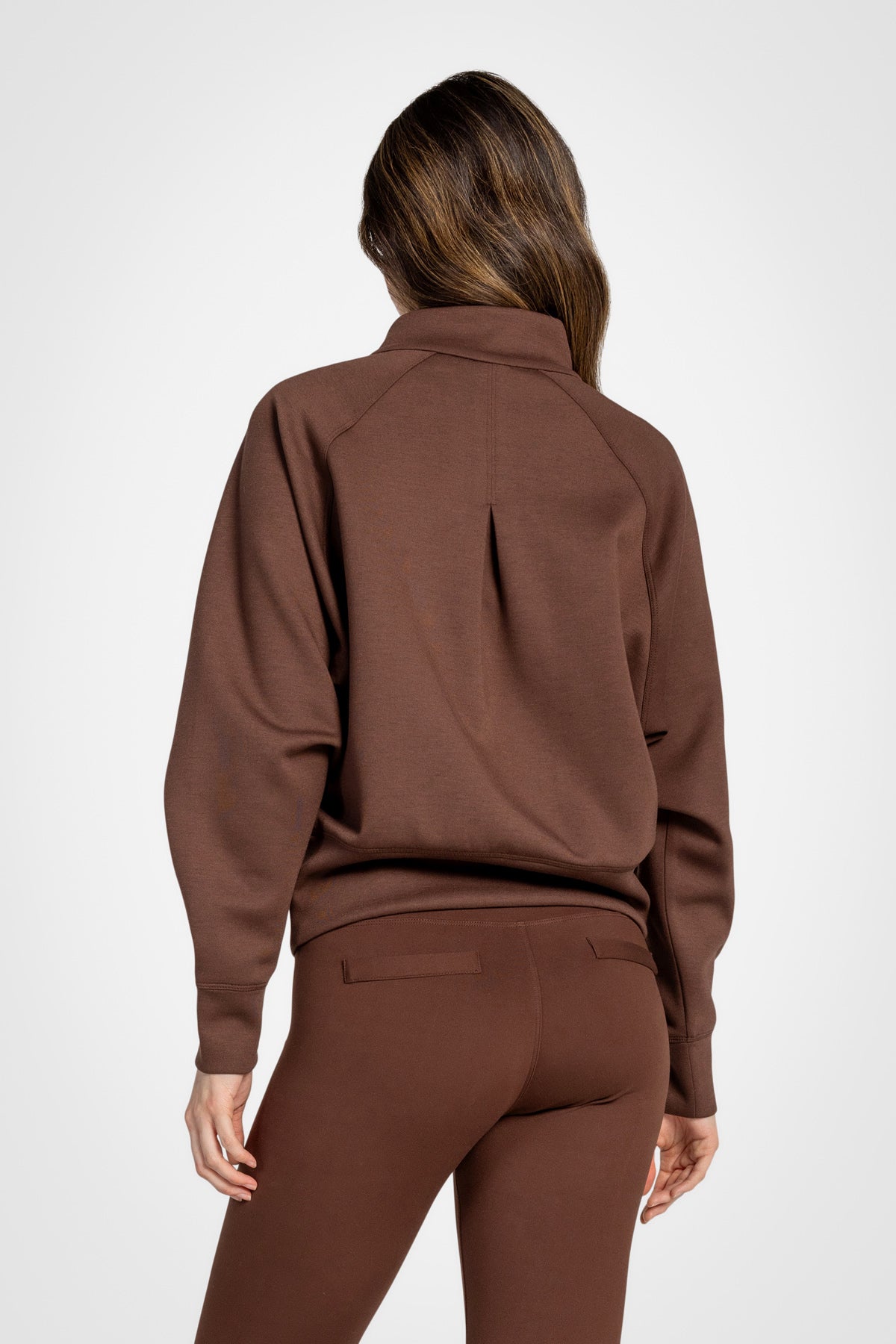 Haut à manches longues et demi-zip en tricot extensible à col montant
