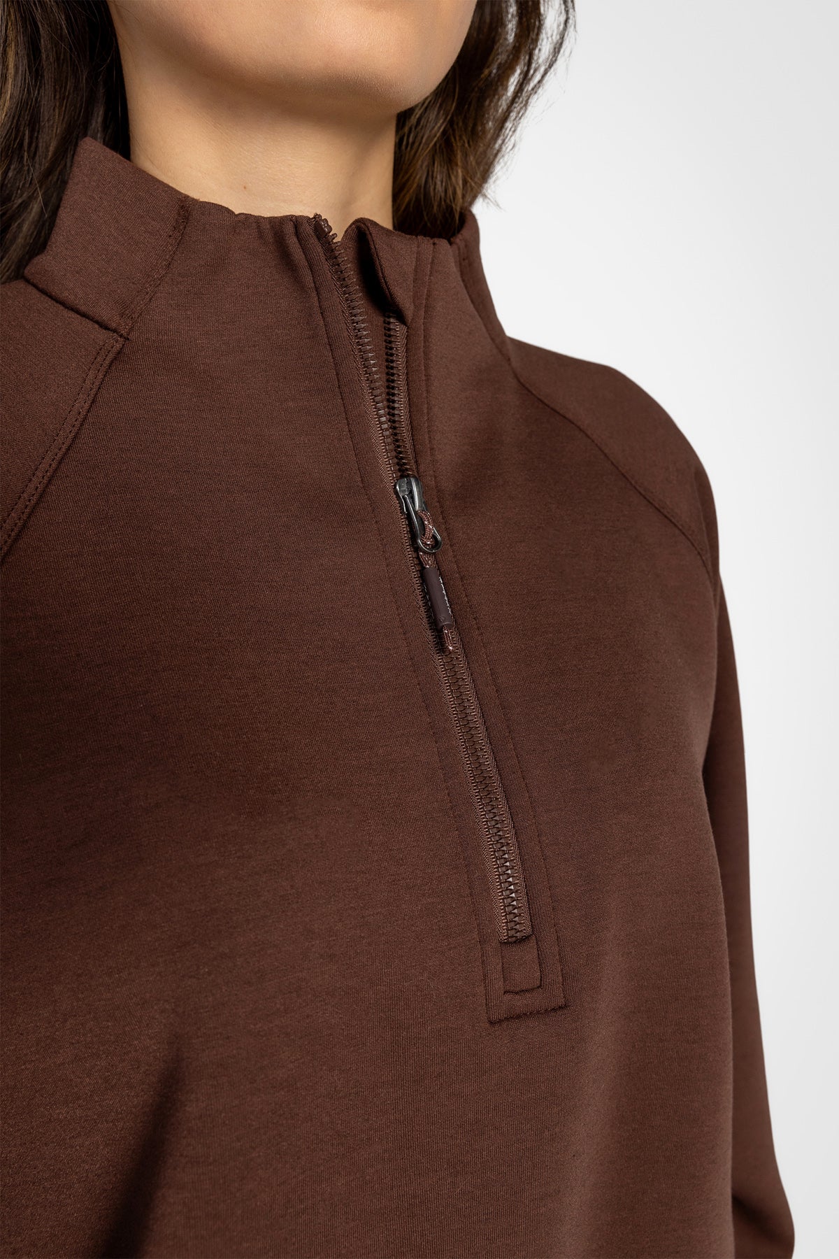 Haut à manches longues et demi-zip en tricot extensible à col montant
