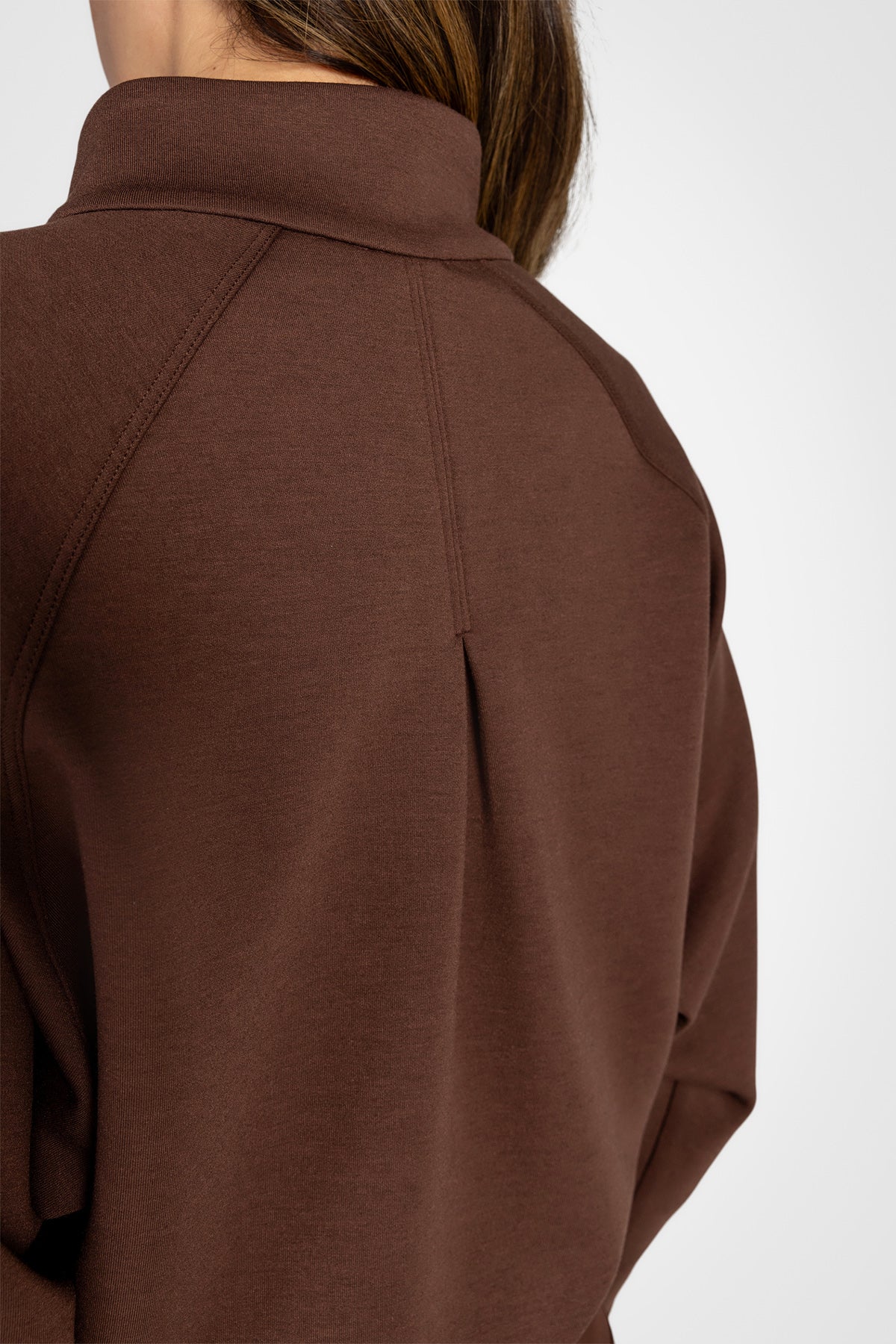 Haut à manches longues et demi-zip en tricot extensible à col montant