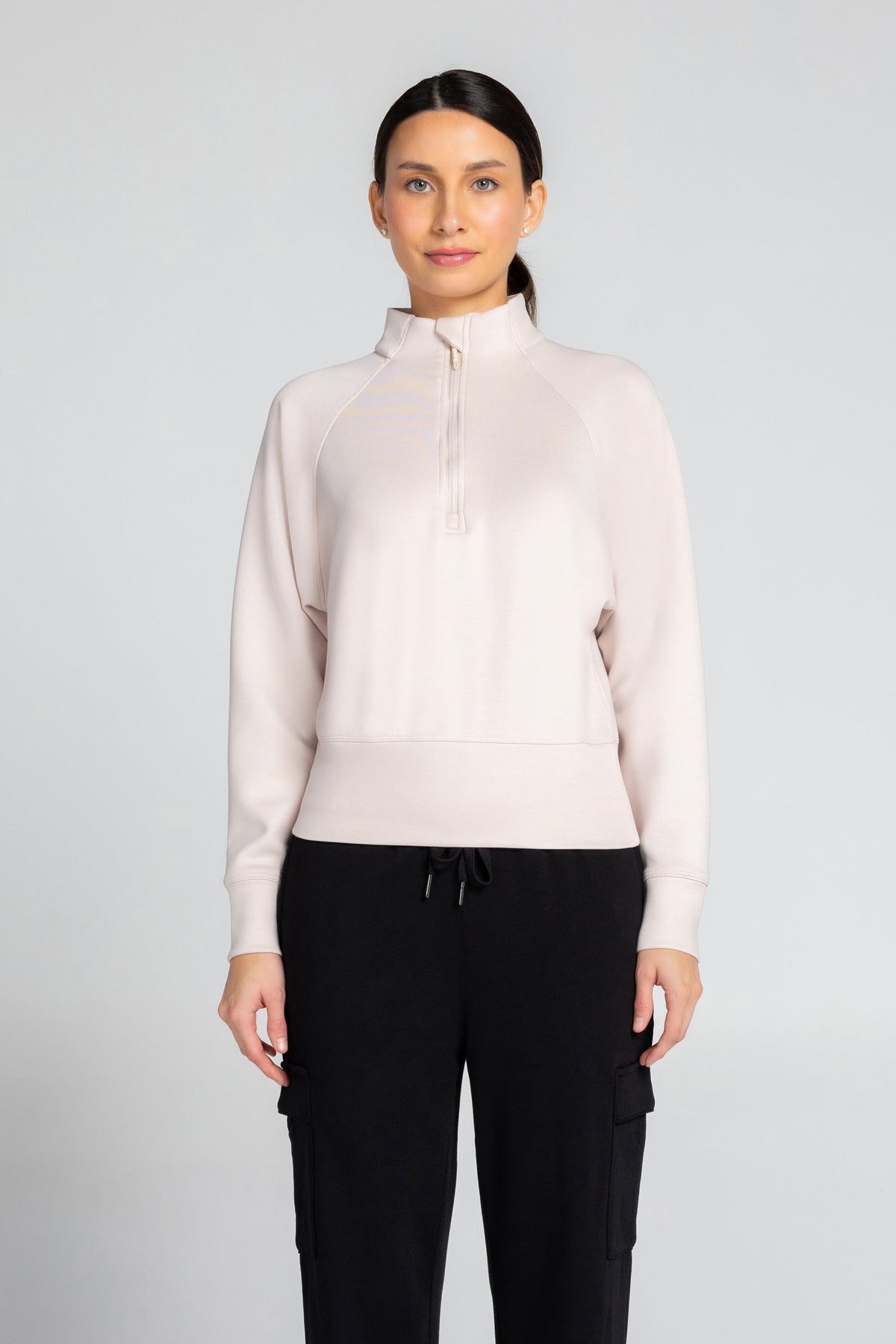 Haut à manches longues et demi-zip en tricot extensible à col montant