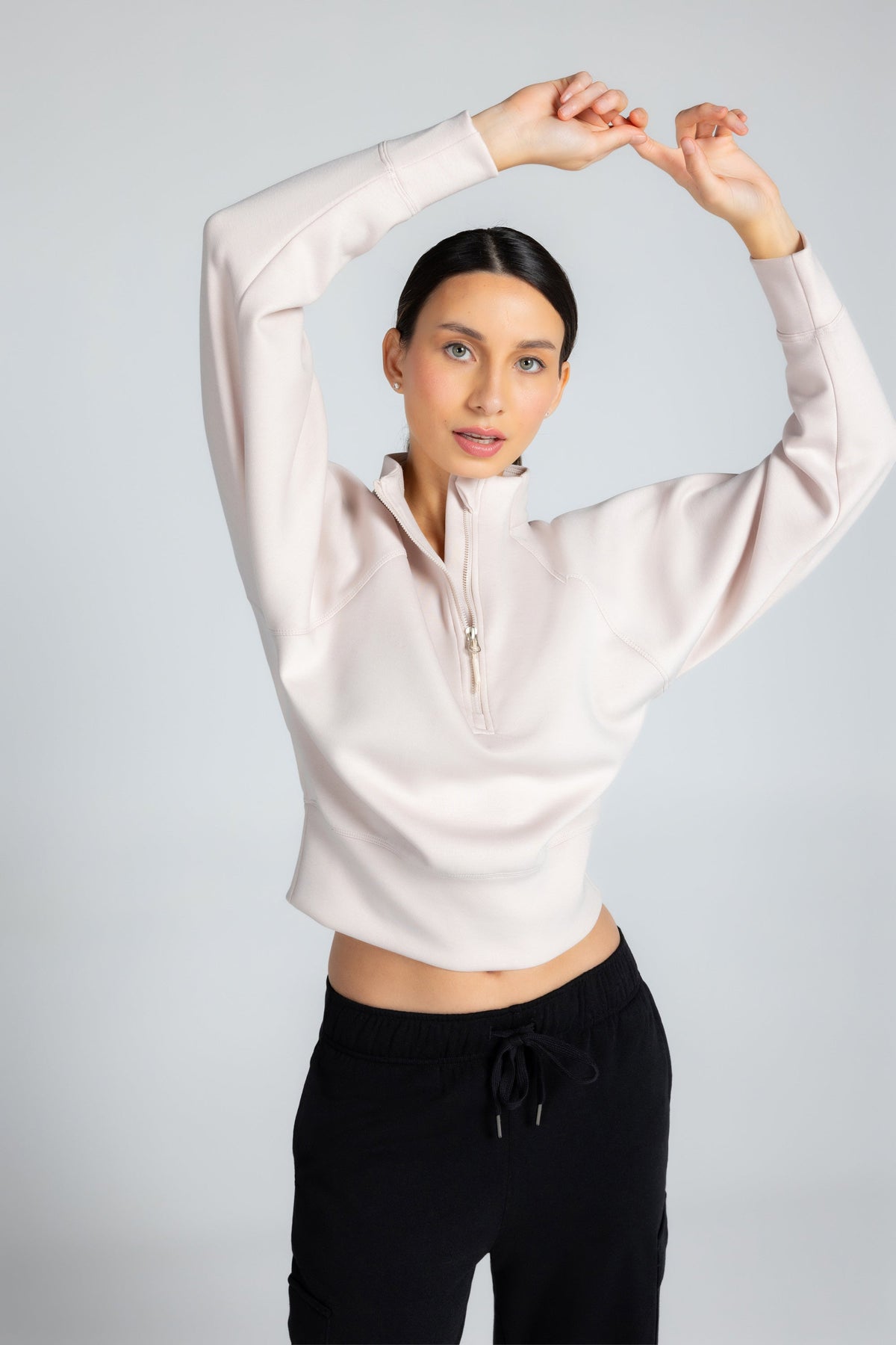 Haut à manches longues et demi-zip en tricot extensible à col montant