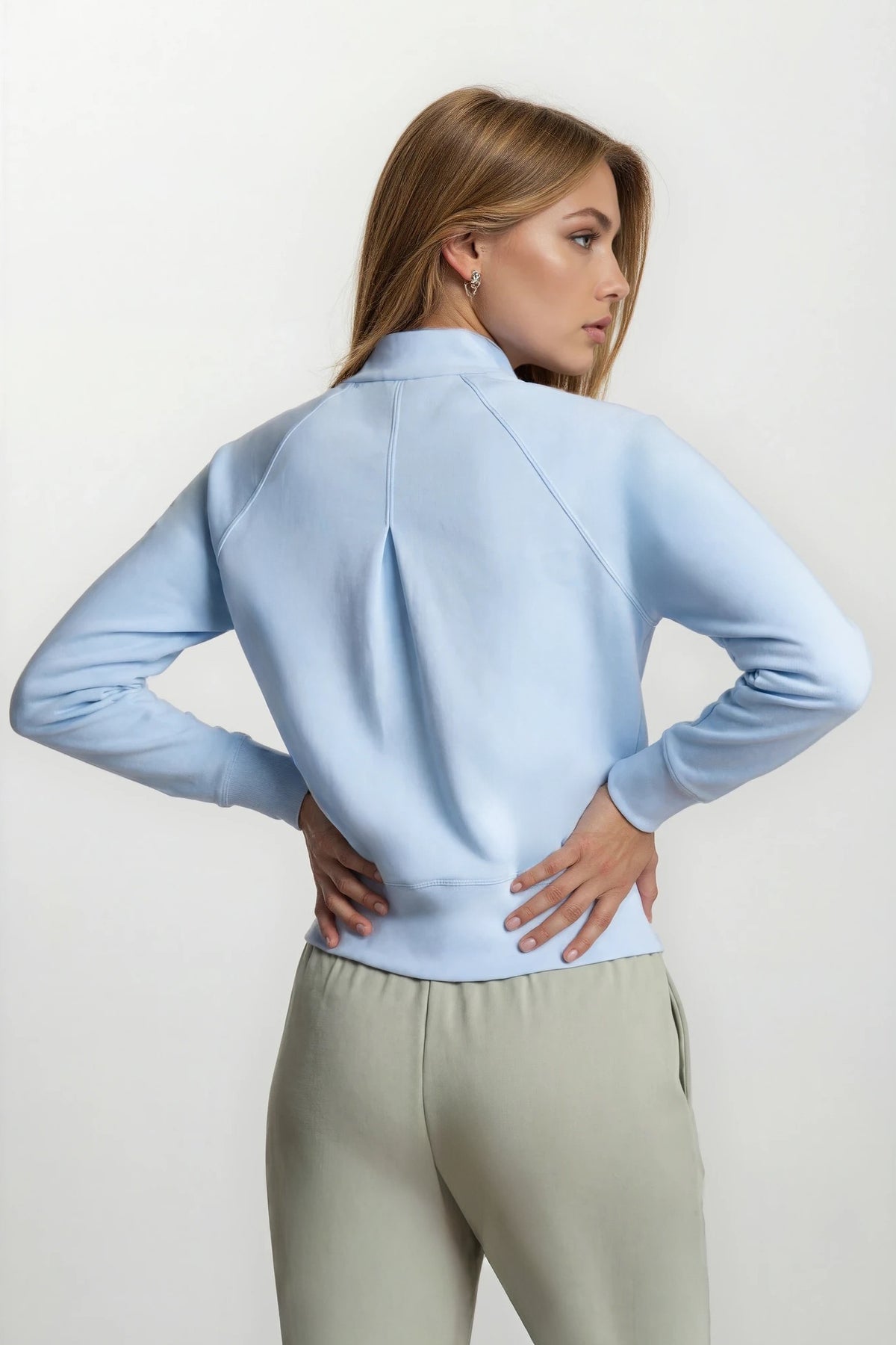 Haut à manches longues et demi-zip en tricot extensible à col montant