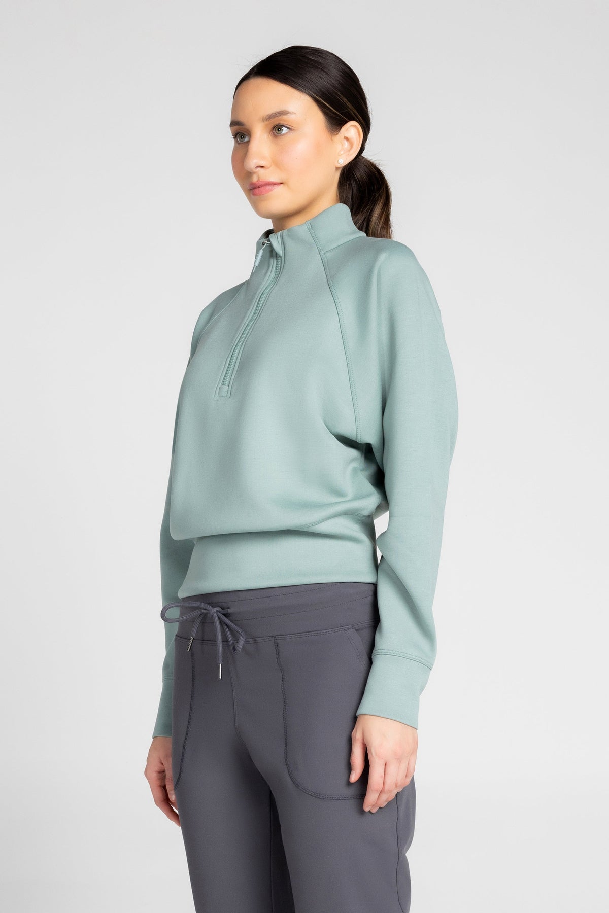 Haut à manches longues et demi-zip en tricot extensible à col montant