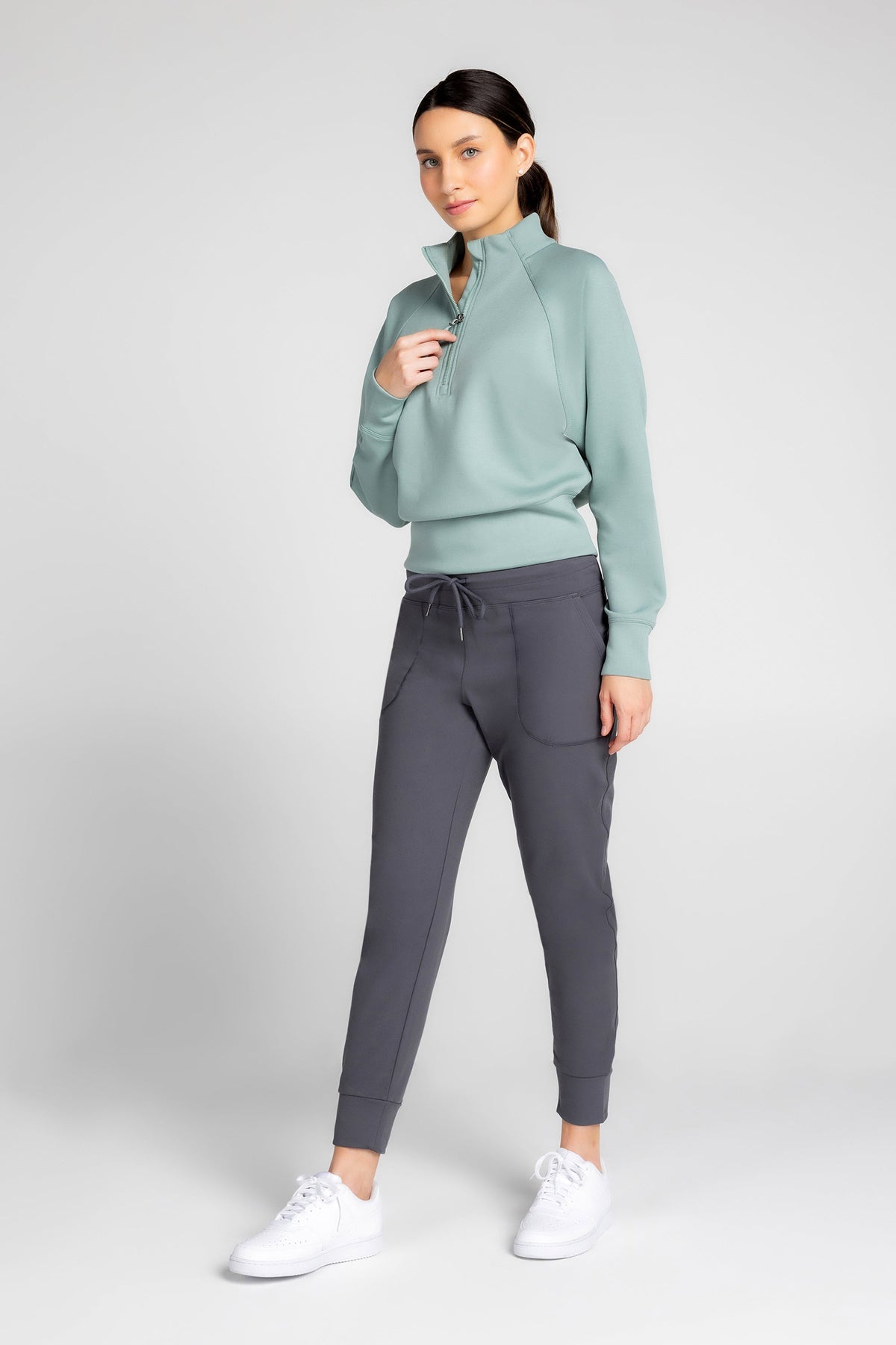 Haut à manches longues et demi-zip en tricot extensible à col montant