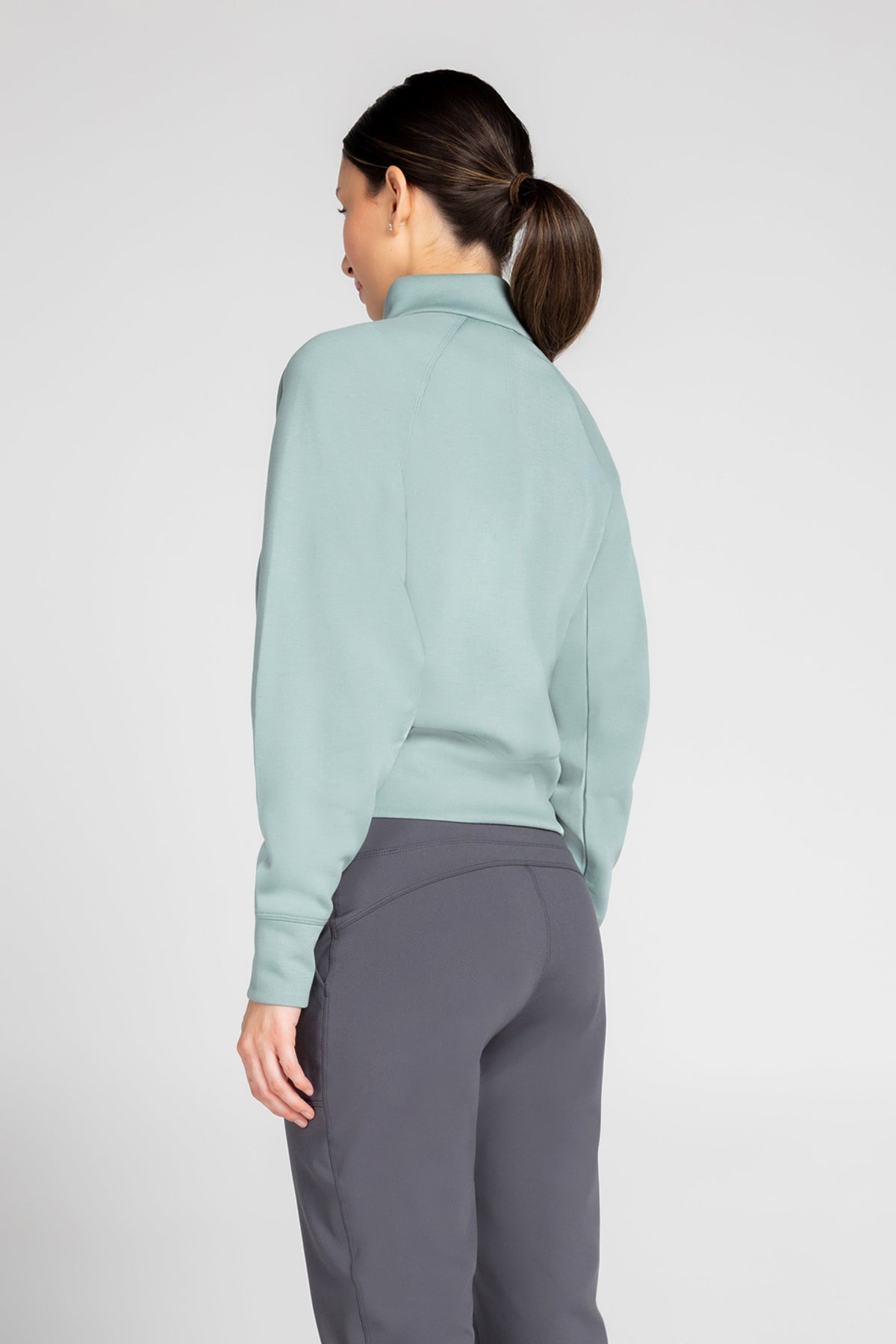 Haut à manches longues et demi-zip en tricot extensible à col montant