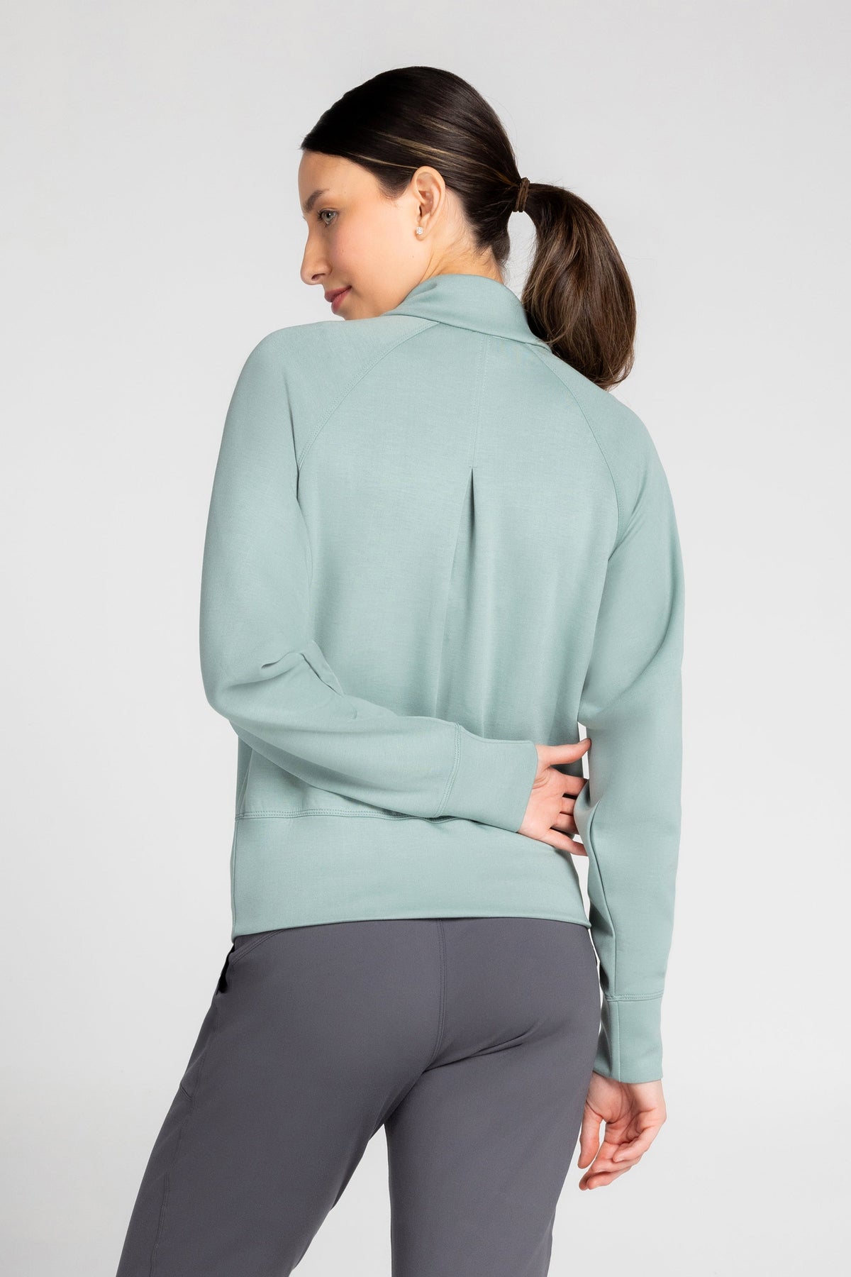 Haut à manches longues et demi-zip en tricot extensible à col montant