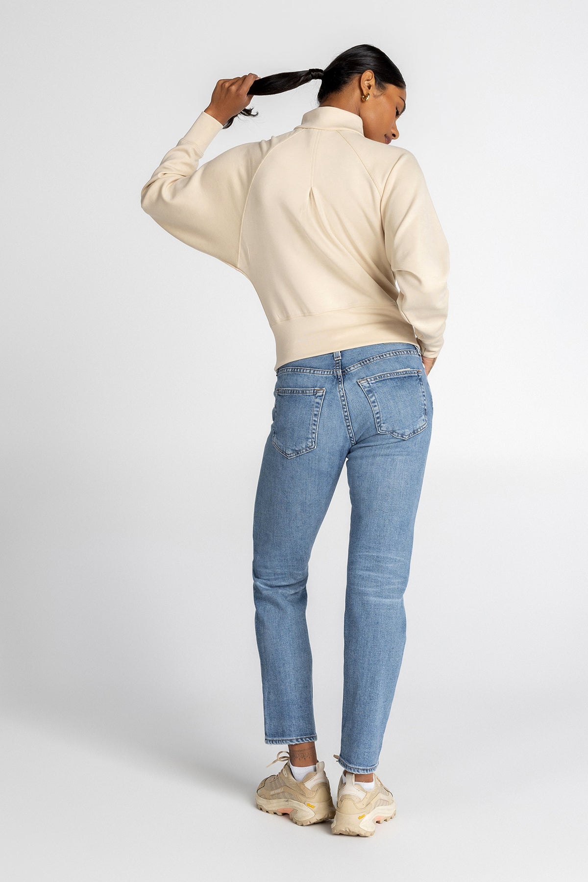 Haut à manches longues et demi-zip en tricot extensible à col montant