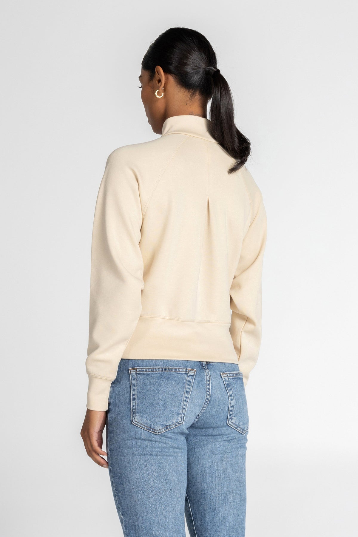 Haut à manches longues et demi-zip en tricot extensible à col montant